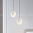 Серия подвесных светильников с разнотипными фигурными плафонами округлой формы из белого мрамора MIEL B фото 7